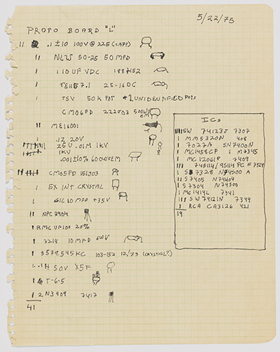 Piece of graph paper torn from a notebook with notes related to Proto Board L written in black ink and dated May 22, 1975.